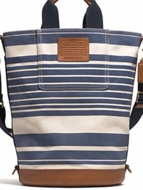 coach heritage backpack stripe Outlet West In Signature Canvas With Varsity Signature coated canvas and smooth leather Two separate main compartments with zip closures Inside zip cell phone and multifunction pockets Fabric lining Top handle with 3 1/4 drop Outside zip pocket Adjustable shoulder straps 12 1/2 (L) x 16 3/4 (H) x 6 (W) Style No. Coach Coach Cv922 West Backpack